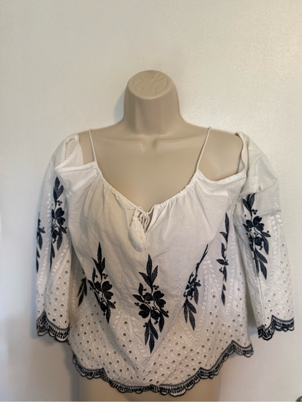 VENUS White Off-Shoulder Embroidered Blouse with Black Floral Accents